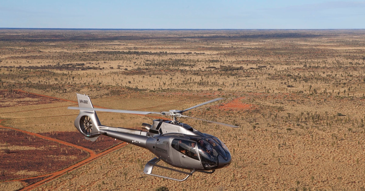 raspberrypg | Experiencing a Scenic Helicopter Flight Over Uluru and Kata Tjuta