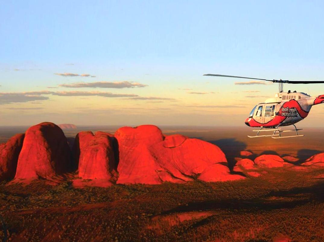 raspberrypg | Experiencing a Scenic Helicopter Flight Over Uluru and Kata Tjuta